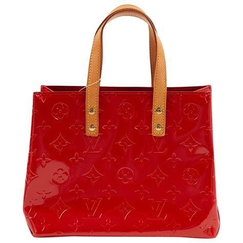 louis vuitton handbag red inside.